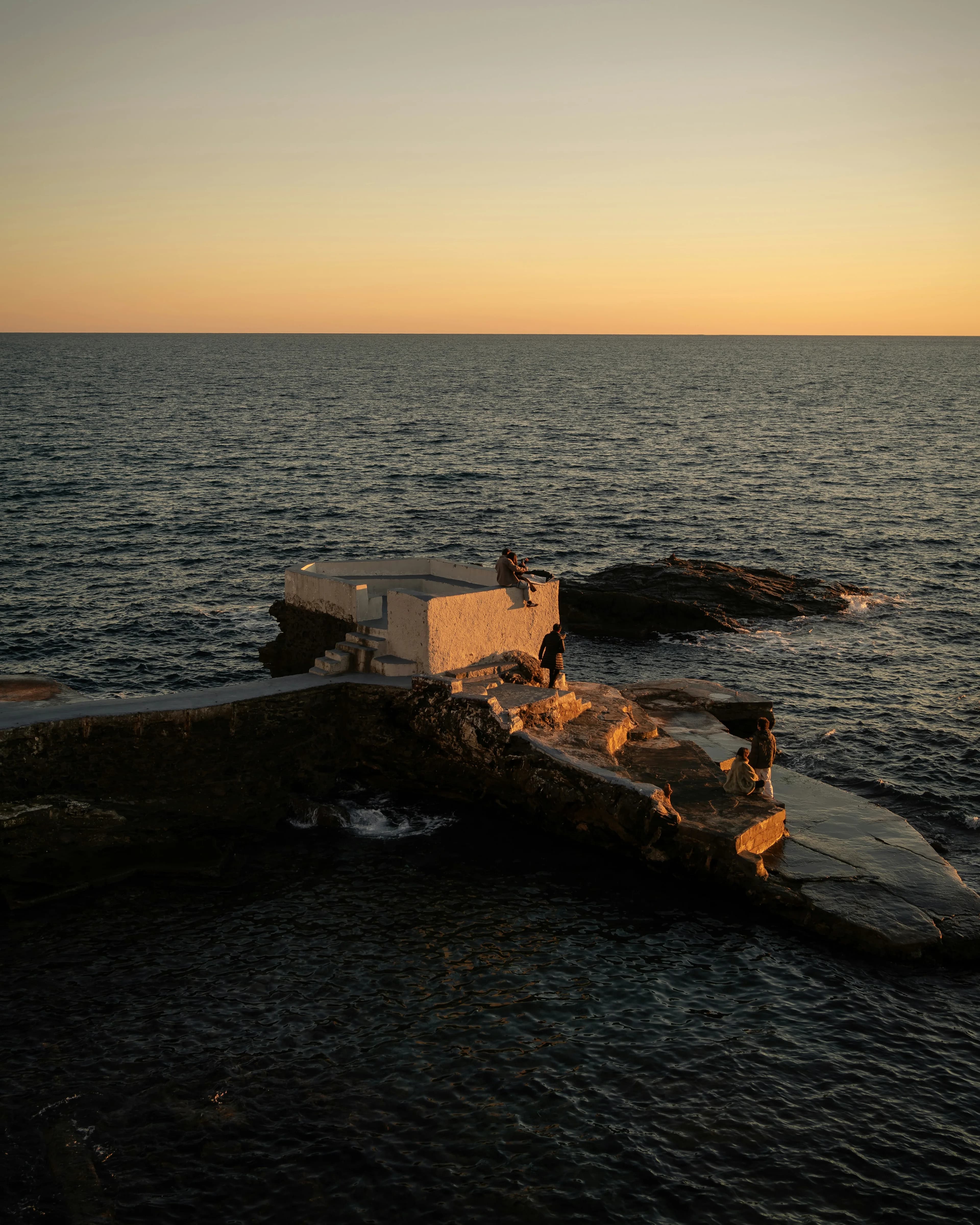 The bathing platform below the house at dusk