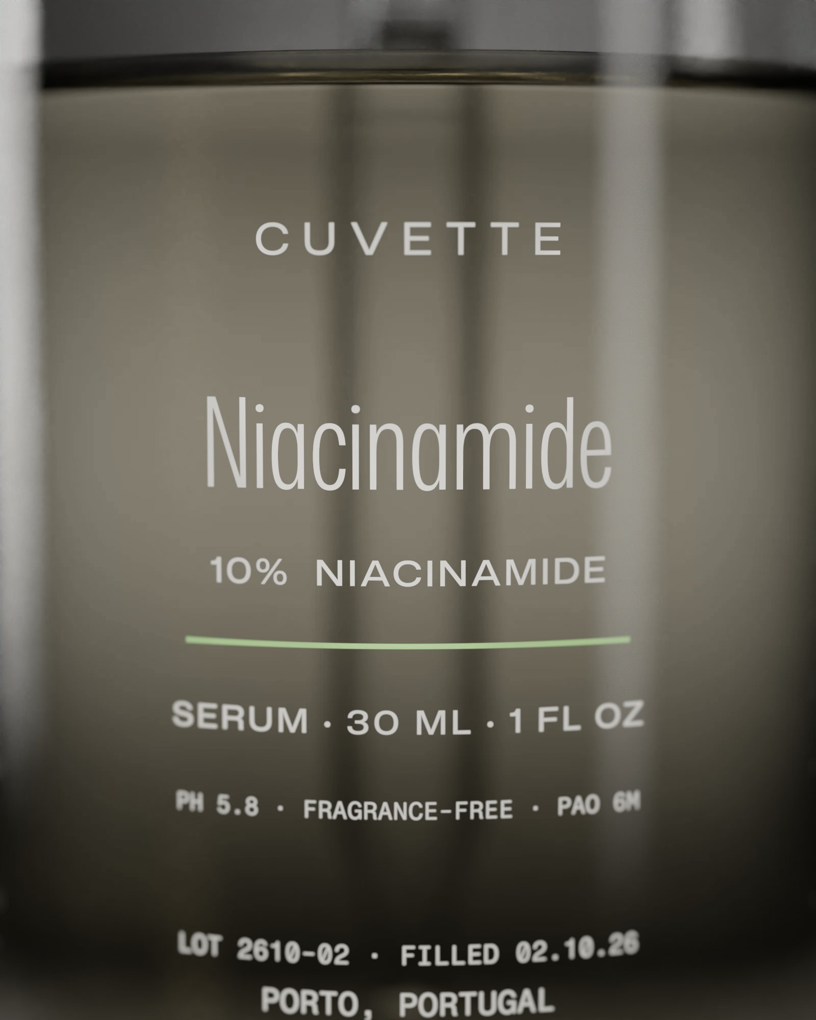 Close-up of the Niacinamide 10% label: lot and strength printed on the glass