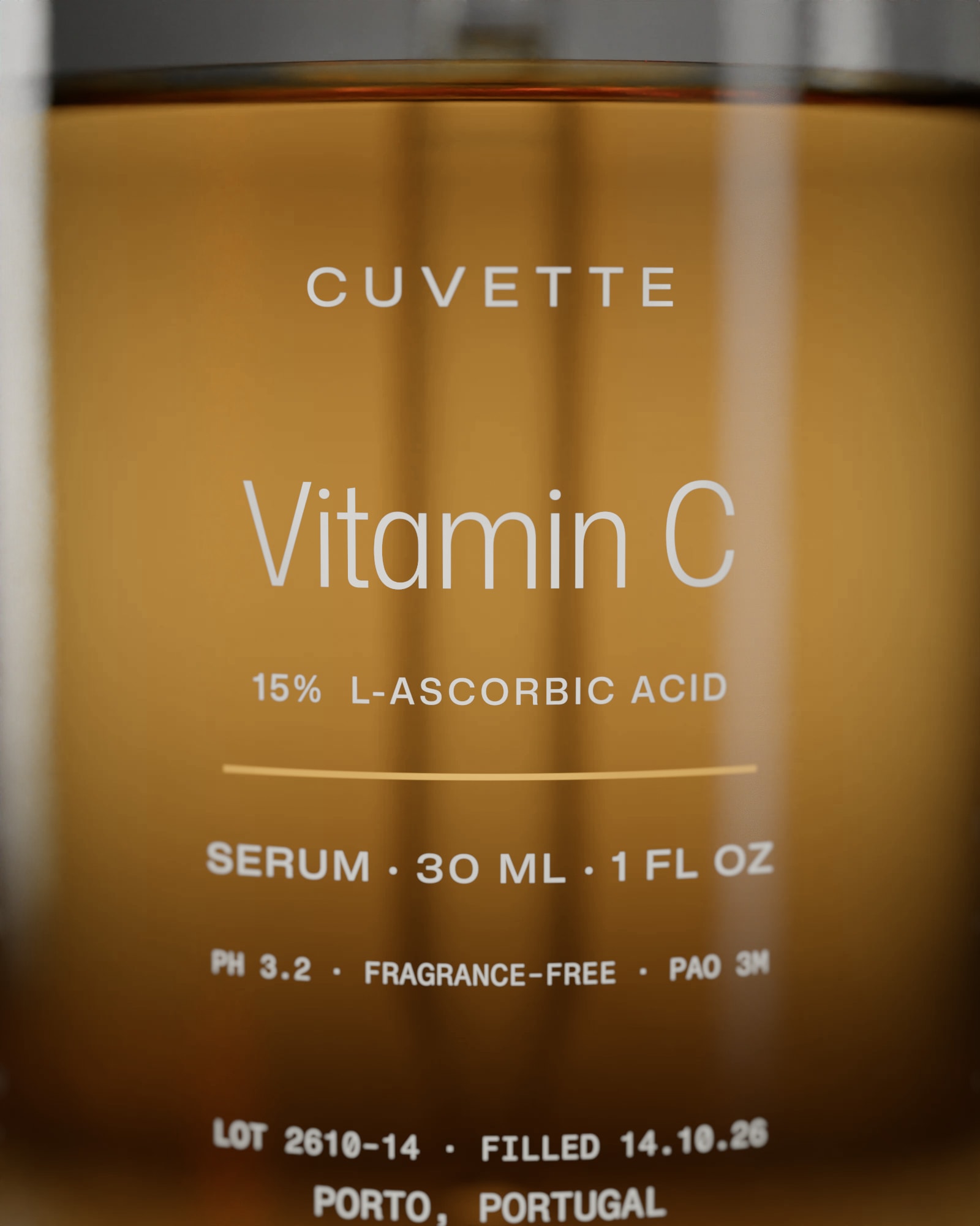 Close-up of the Vitamin C 15% label: lot and strength printed on the glass